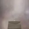 Bolso de mano pequeño con bandolera Bolso de mano pequeño con bandolera