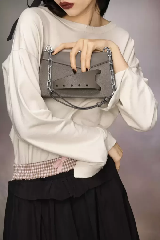 Bolso de mano pequeño con bandolera Bolso de mano pequeño con bandolera