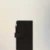 Cartera con cremallera de cuatro puntadas Cartera con cremallera de cuatro puntadas