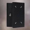 Cartera de bolsillo con cuatro puntadas Cartera de bolsillo con cuatro puntadas