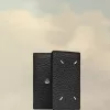 Cartera de cuatro puntadas Cartera de cuatro puntadas