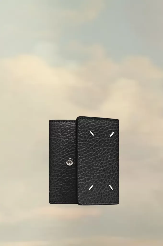 Cartera de cuatro puntadas Cartera de cuatro puntadas