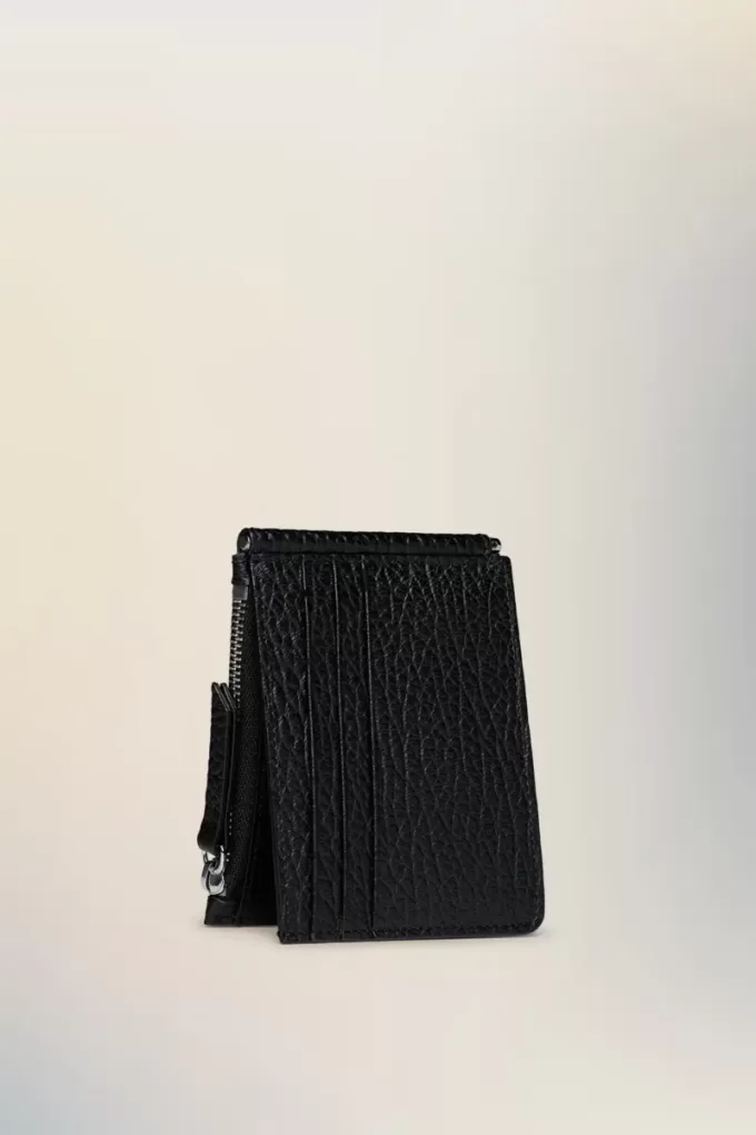 Cartera de cuatro puntadas Cartera de cuatro puntadas
