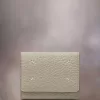 Cartera de cuatro puntadas Cartera de cuatro puntadas