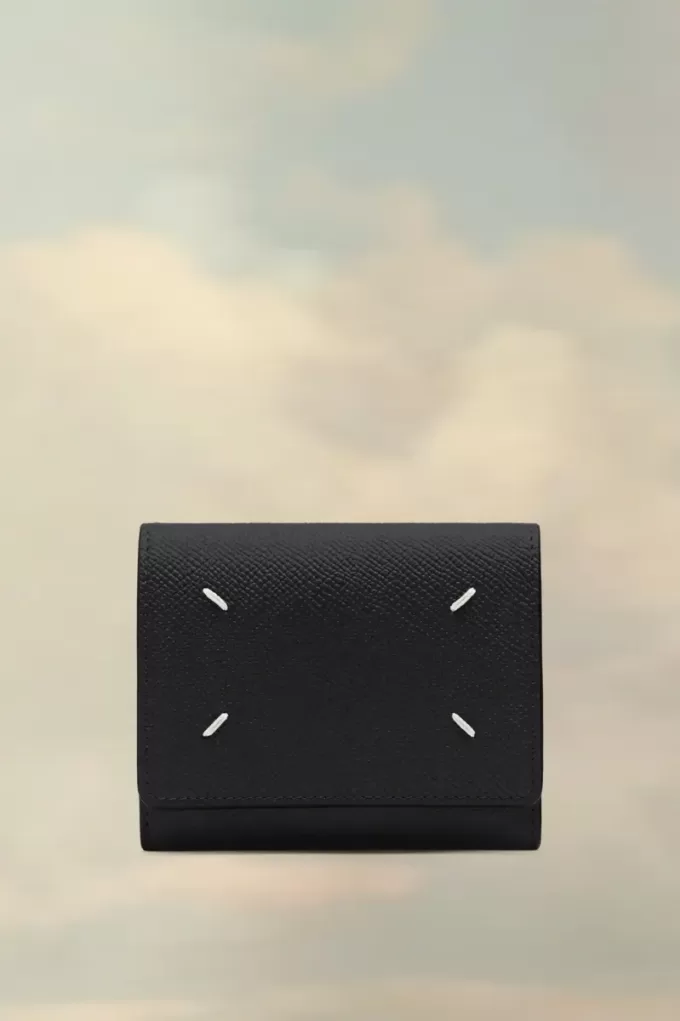 Cartera de cuatro puntadas Cartera de cuatro puntadas