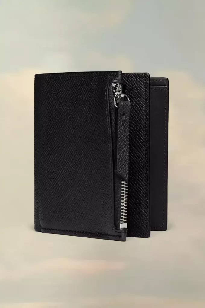 Cartera de cuatro puntadas Cartera de cuatro puntadas