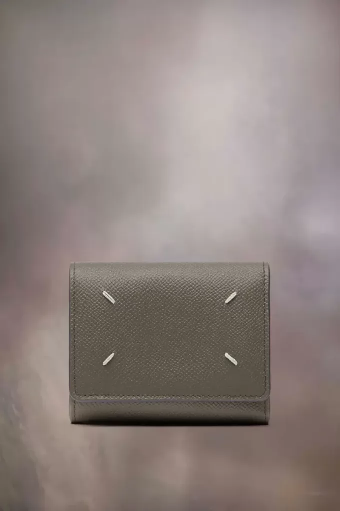 Cartera de cuatro puntadas Cartera de cuatro puntadas