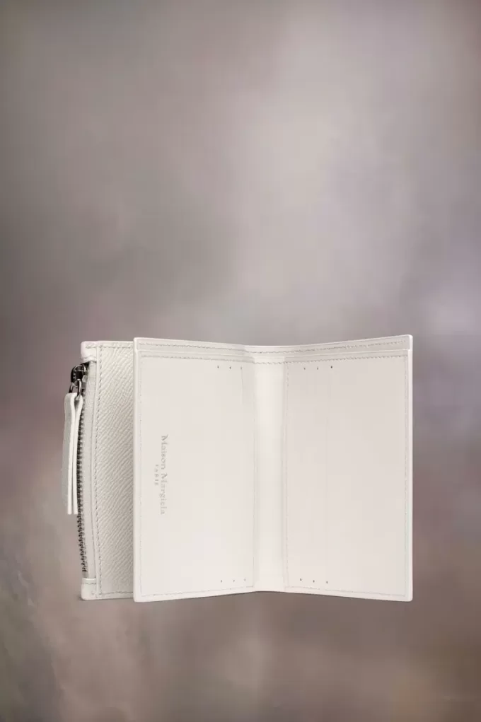 Cartera de cuatro puntadas Cartera de cuatro puntadas