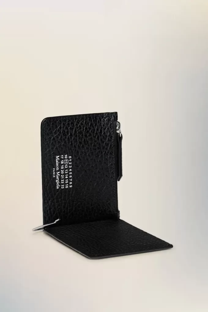 Cartera de cuatro puntadas Cartera de cuatro puntadas