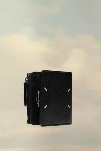 Cartera de cuatro puntadas