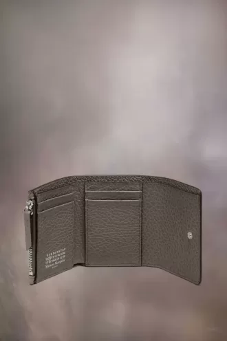 Cartera de cuatro puntadas