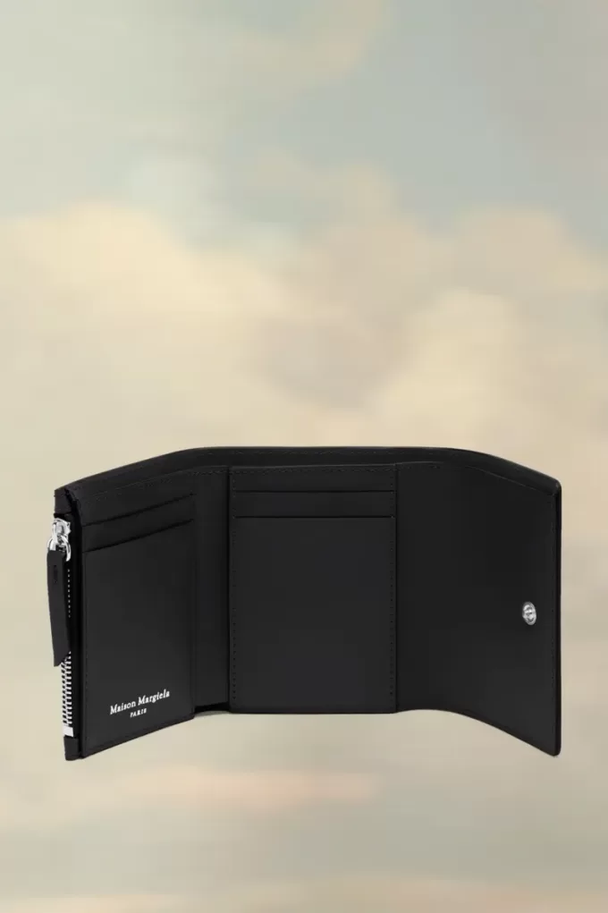 Cartera de cuatro puntadas Cartera de cuatro puntadas