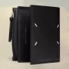 Cartera de cuatro puntadas Cartera de cuatro puntadas