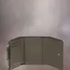 Cartera de cuatro puntadas Cartera de cuatro puntadas
