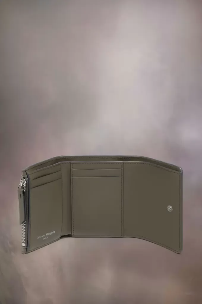 Cartera de cuatro puntadas Cartera de cuatro puntadas