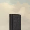 Cartera de cuatro puntadas Cartera de cuatro puntadas