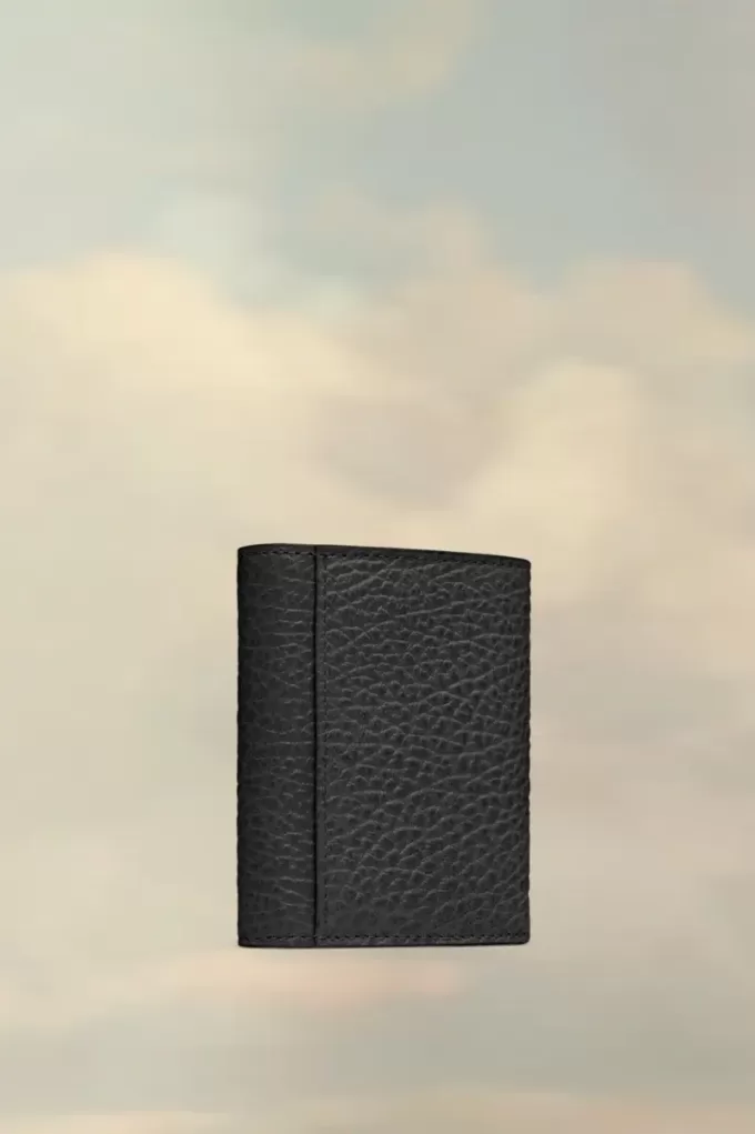 Cartera de cuatro puntadas Cartera de cuatro puntadas