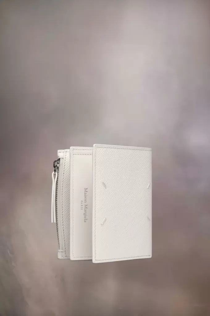 Cartera de cuatro puntadas Cartera de cuatro puntadas