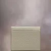 Cartera de cuatro puntadas Cartera de cuatro puntadas