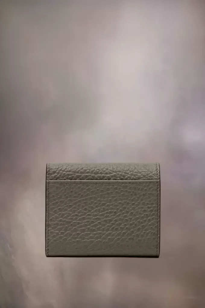 Cartera de cuatro puntadas Cartera de cuatro puntadas