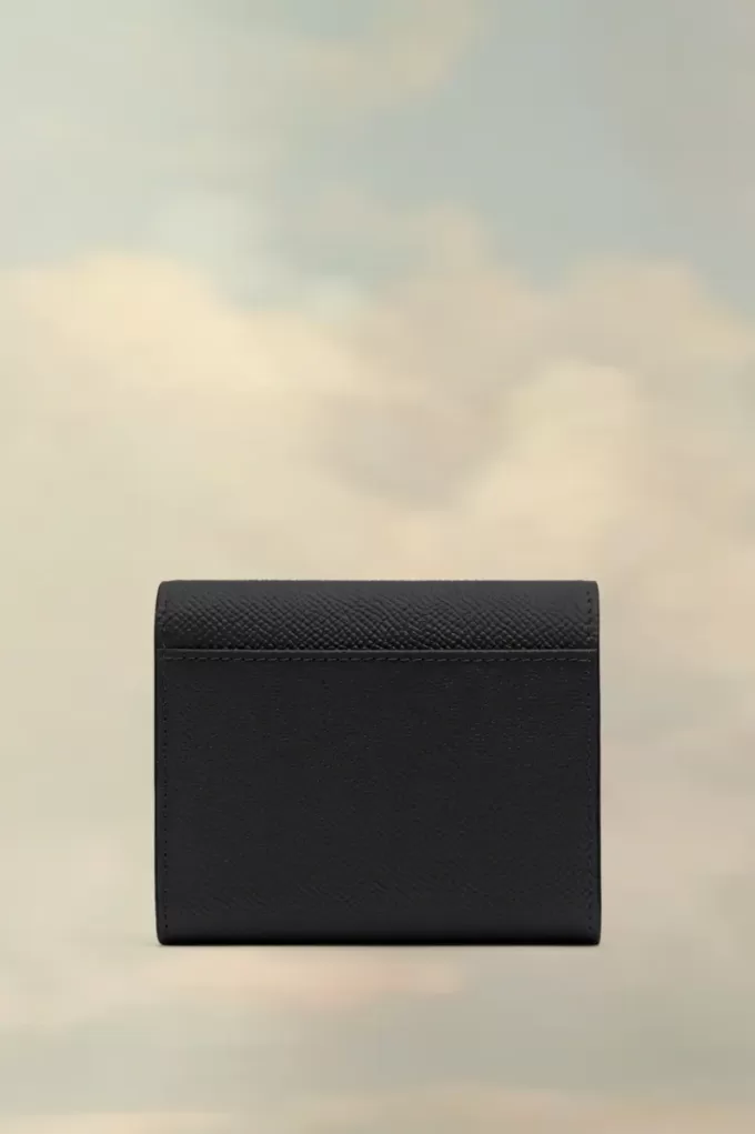 Cartera de cuatro puntadas Cartera de cuatro puntadas