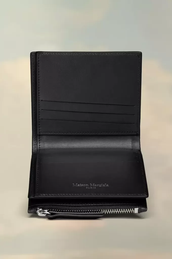 Cartera de cuatro puntadas Cartera de cuatro puntadas