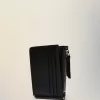 Cartera de cuatro puntadas Cartera de cuatro puntadas