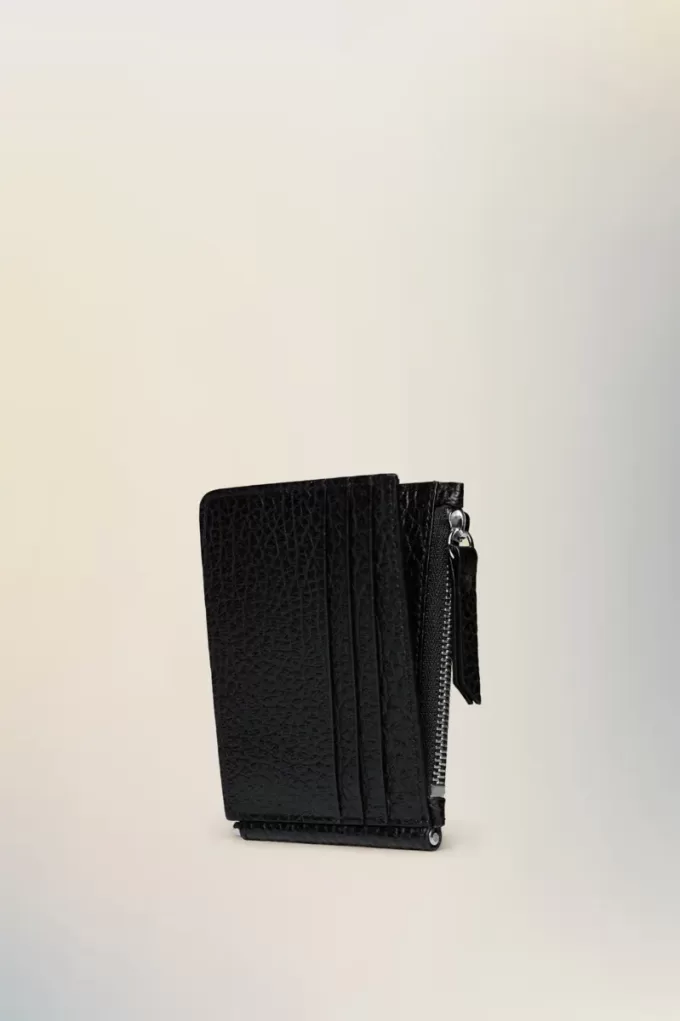 Cartera de cuatro puntadas Cartera de cuatro puntadas