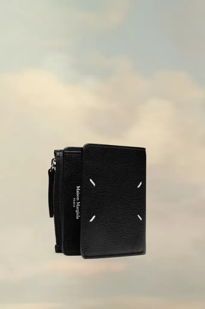 Cartera de cuatro puntadas Cartera de cuatro puntadas