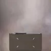 Cartera tarjetero con cuatro puntadas Cartera tarjetero con cuatro puntadas