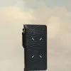 Cartera tarjetero con cuatro puntadas Cartera tarjetero con cuatro puntadas