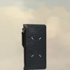 Cartera tarjetero con cuatro puntadas Cartera tarjetero con cuatro puntadas