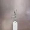 Llavero de cuatro puntadas