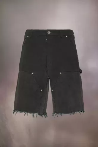 Pantalones cortos vaqueros con tachuelas de Maison Margiela