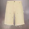 Pantalones cortos vaqueros con tachuelas de Maison Margiela Pantalones cortos vaqueros con tachuelas de Maison Margiela