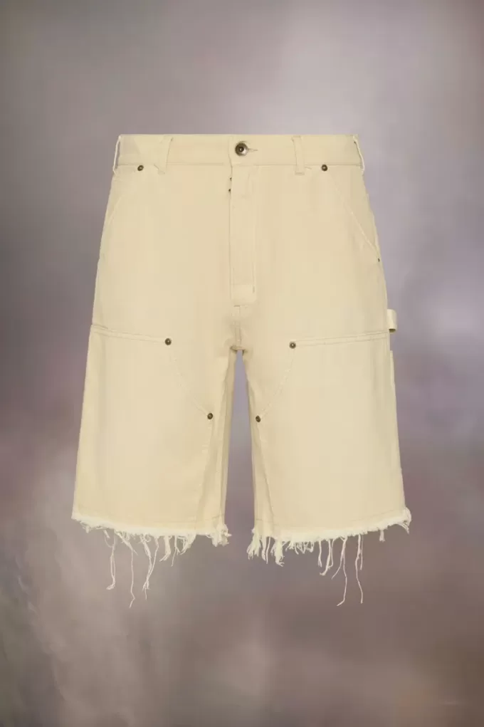 Pantalones cortos vaqueros con tachuelas de Maison Margiela Pantalones cortos vaqueros con tachuelas de Maison Margiela