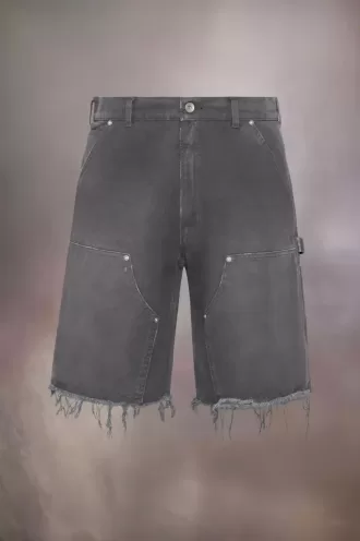 Pantalones cortos vaqueros con tachuelas de Maison Margiela