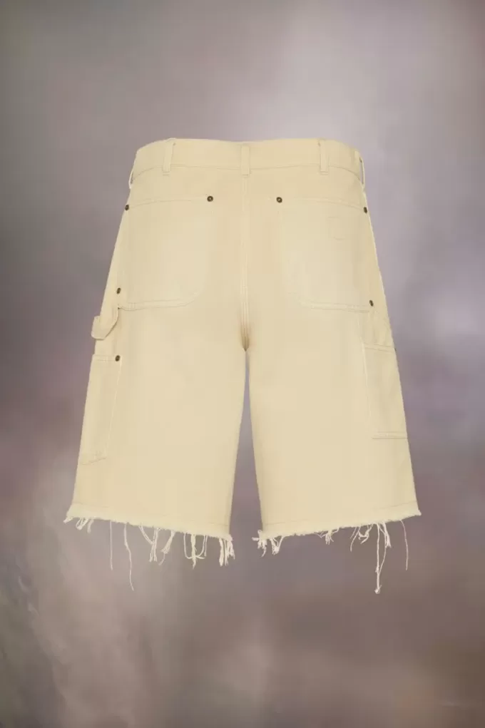 Pantalones cortos vaqueros con tachuelas de Maison Margiela Pantalones cortos vaqueros con tachuelas de Maison Margiela