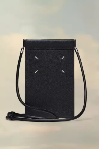 Soporte para teléfono con cuatro puntadas