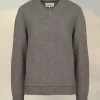 Suéter con coderas de Maison Margiela Suéter con coderas de Maison Margiela