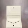 Tarjetero de bolsillo con cuatro puntadas Tarjetero de bolsillo con cuatro puntadas