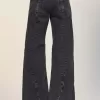 Vaqueros con cortes de Maison Margiela Vaqueros con cortes de Maison Margiela